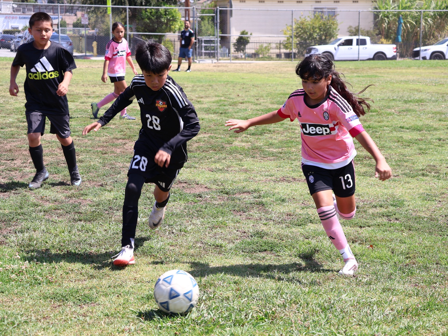 Alhambra FC youth player in game action